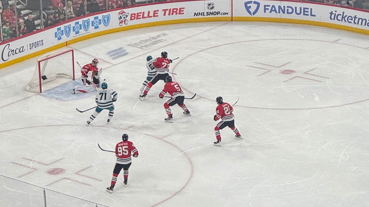 Watching Two Hockey Players Score in Chicago